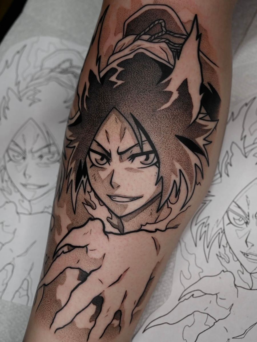 Yoruichi tattoo, Bleach character wearing headband with fierce stare by Wade Whitman — Madison Heights MI tattoo artist