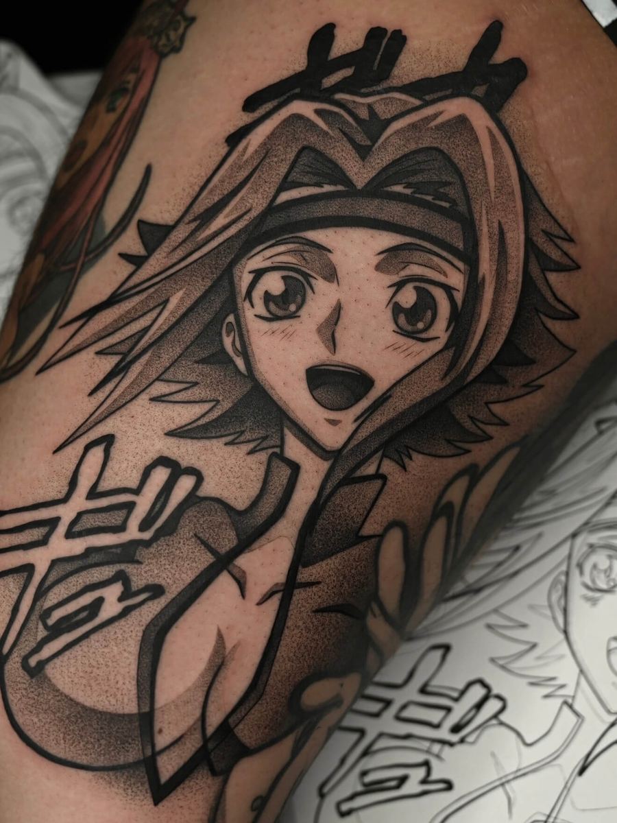 Kallen Stadtfeld tattoo, Code Geass character with braided hair and wide-eyed expression by Wade Whitman — Madison Heights MI tattoo artist