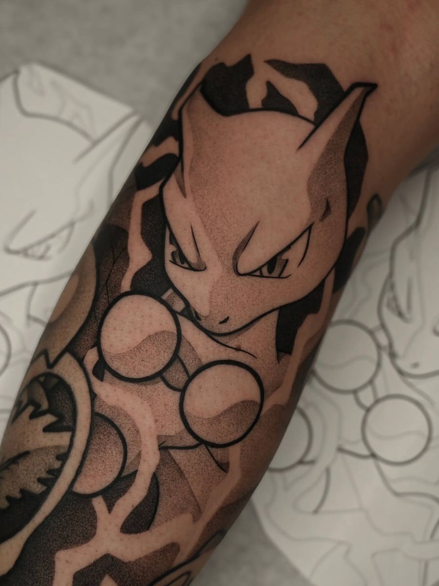 Mewtwo tattoo, Pokemon character in blue-gray tones by Wade Whitman — Madison Heights MI tattoo artist