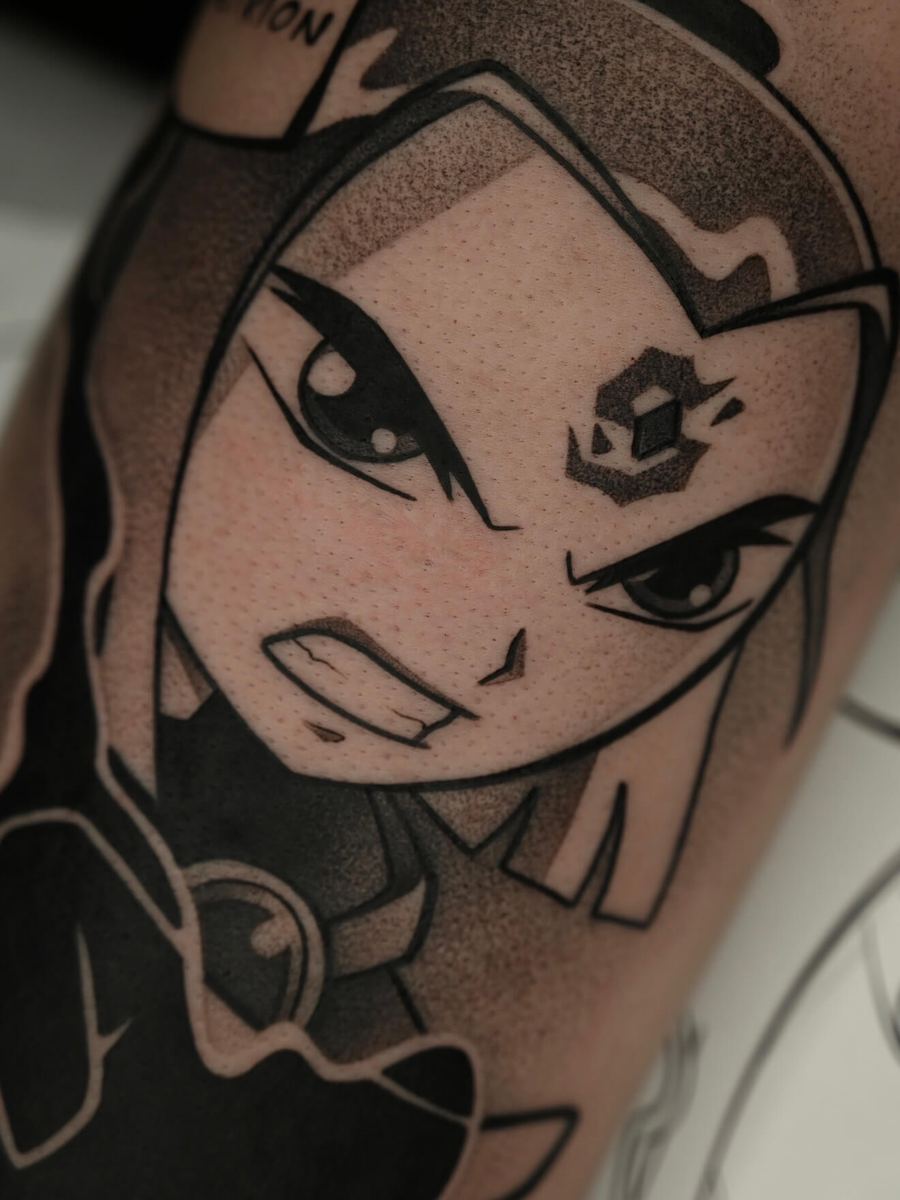 Raven tattoo, Teen Titans character with dark ornate markings, fierce expression by Wade Whitman — Madison Heights MI tattoo artist
