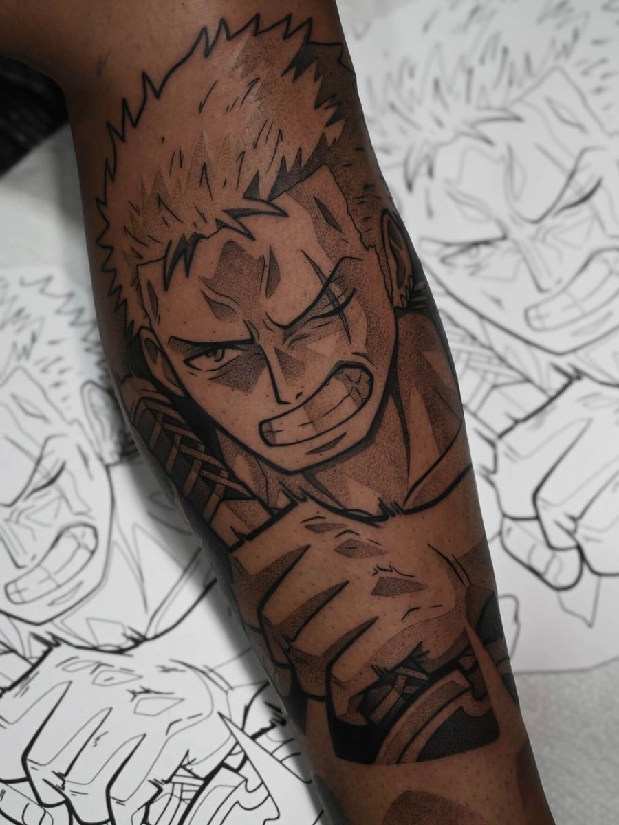 Roronoa Zoro tattoo, One Piece character forearm portrait with spiky hair, clenched expression by Wade Whitman — Madison Heights MI tattoo artist