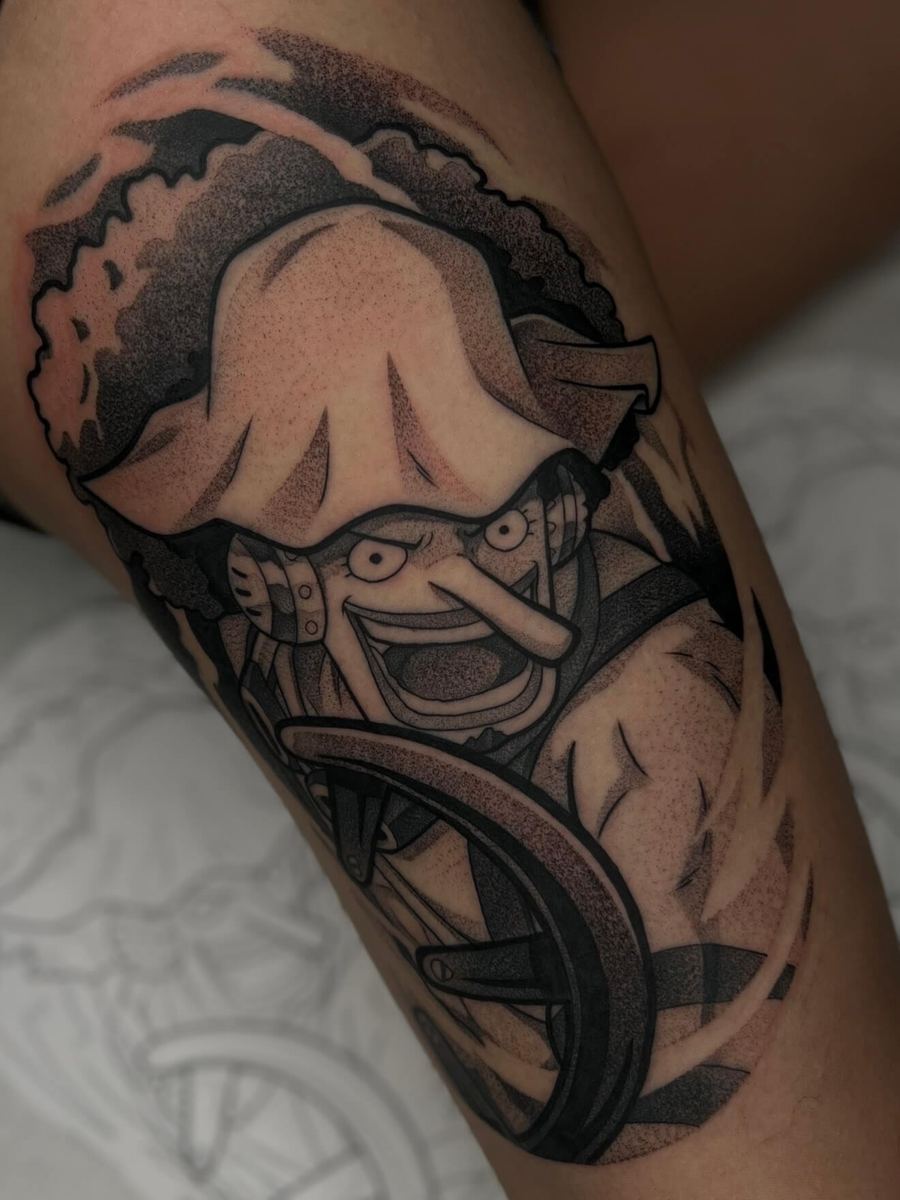 Usopp tattoo, One Piece character portrait with layered hooded clothing by Wade Whitman — Madison Heights MI tattoo artist