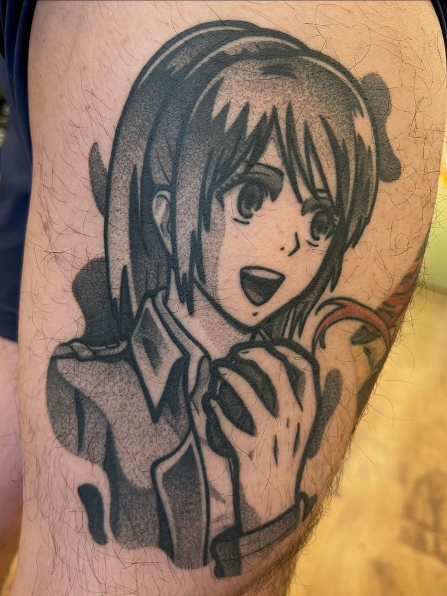 Sasha Braus tattoo, Attack on Titan character known as Potato Girl, hands clasped thoughtfully by Wade Whitman — Madison Heights MI tattoo artist