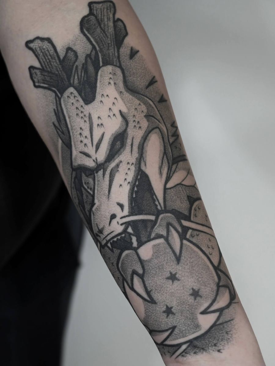 Shenron tattoo, Dragon Ball Z dragon claw holding a star-marked Dragon Ball by Wade Whitman — Madison Heights MI tattoo artist