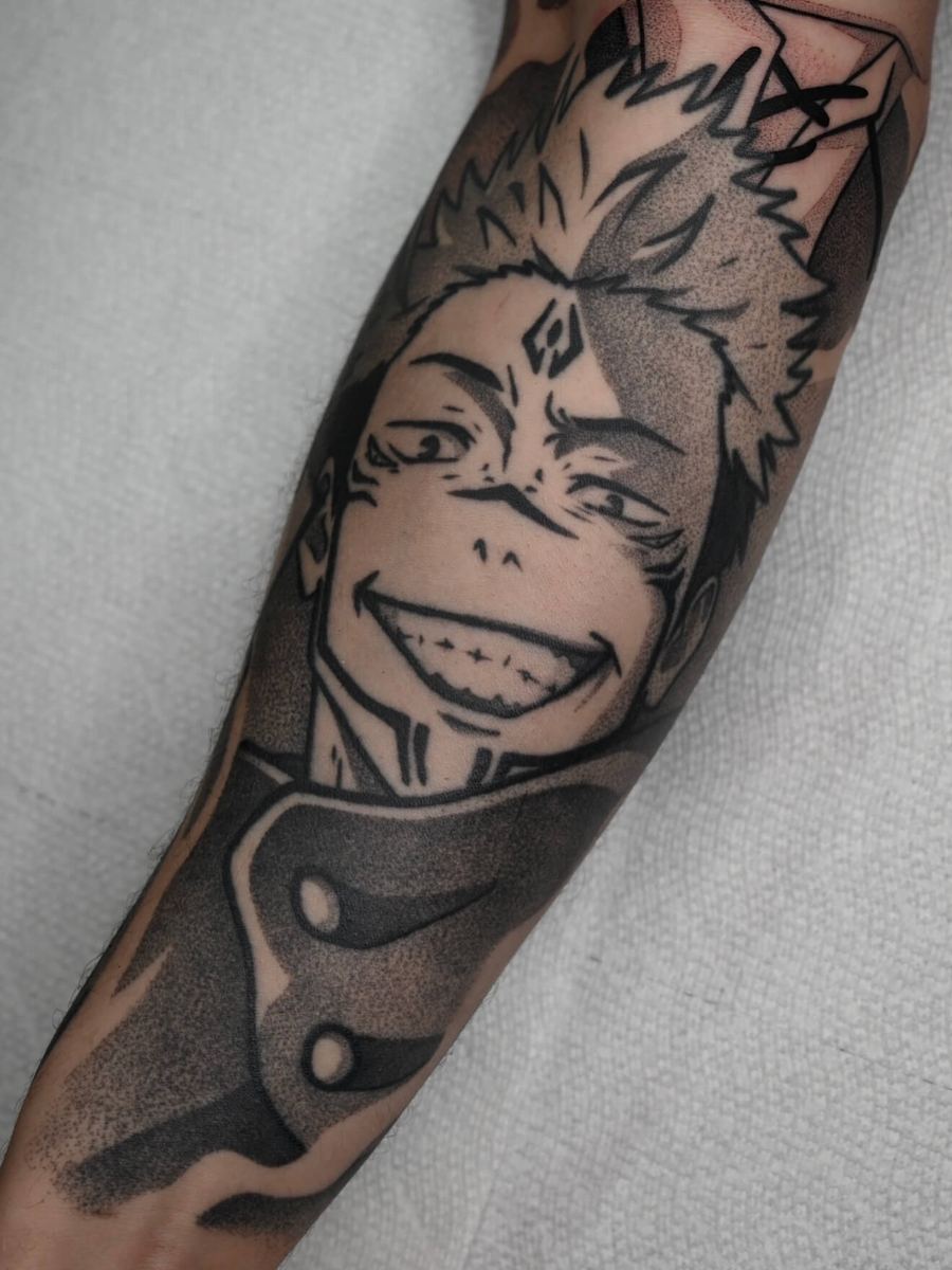 Ryomen Sukuna tattoo, Jujutsu Kaisen character wide grimace, tan-toned shading by Wade Whitman — Madison Heights MI tattoo artist