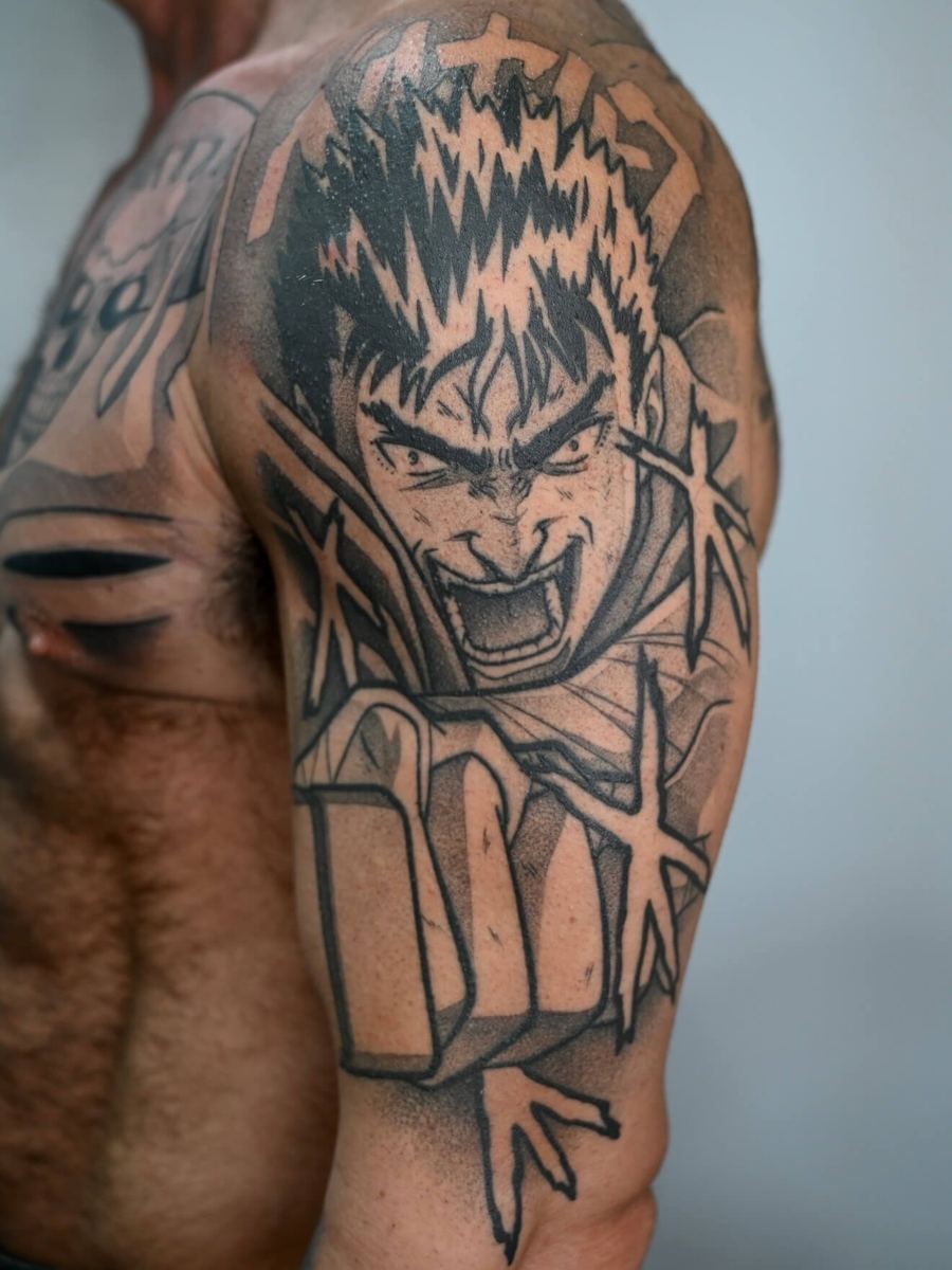 Guts tattoo, Berserk character swinging a sword, intense battle-ready expression by Wade Whitman — Madison Heights MI tattoo artist