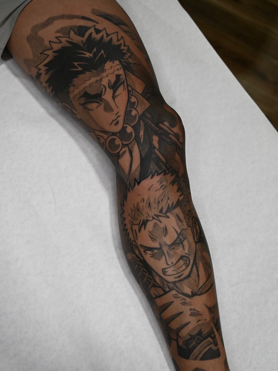 Gyomei and Zoro tattoo, Demon Slayer Stone Hashira and One Piece full leg sleeve with skull motif by Wade Whitman — Madison Heights MI tattoo artist