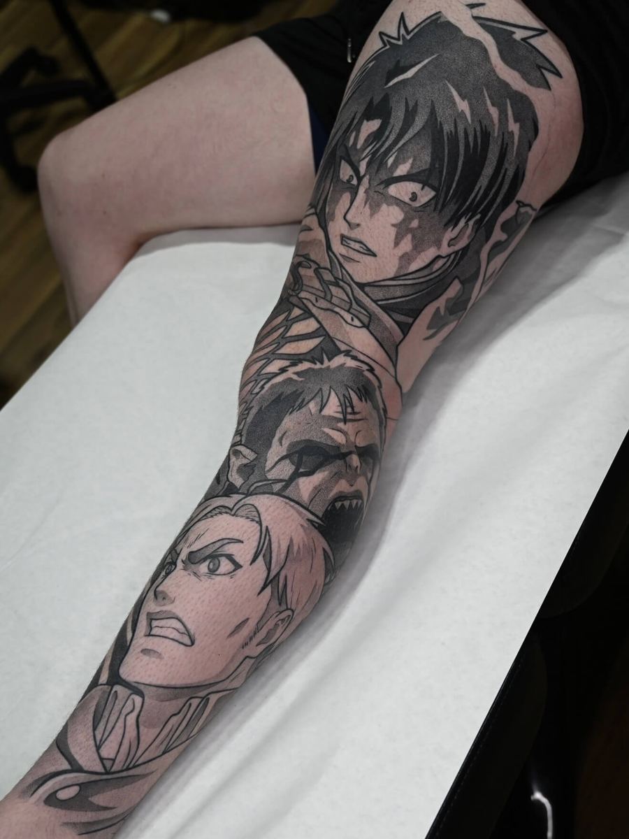 Levi Ackerman and Erwin tattoo, Attack on Titan full arm sleeve fighting the Beast Titan, bold black linework by Wade Whitman — Madison Heights MI tattoo artist